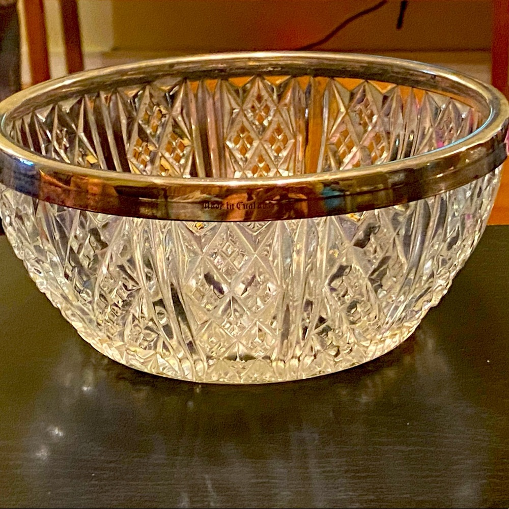Heavy large crystal bowl with silver rim “made in England”